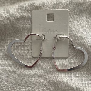 NWT silvertone heart earrings. Perfect for Valentine’s Day or anytime.